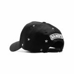 Gorra Dandy Hats Stars & Studs negra con estrellas y tachuelas metálicas en relieve 3D, vista trasera