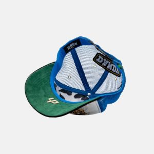 Gorra Dandy Hats Chunky Dandy trucker blanca y azul con logo cow print, vista interior